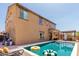 Gorgeous backyard featuring a beautiful pool, covered patio and desert landscaping at 20366 E Via De Colina --, Queen Creek, AZ 85142