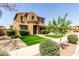 Inviting two-story home with landscaped front yard and covered driveway at 20366 E Via De Colina --, Queen Creek, AZ 85142
