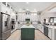 Spacious kitchen featuring a green island, stainless steel appliances, and plenty of storage at 20366 E Via De Colina --, Queen Creek, AZ 85142