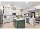 Bright kitchen showcasing an island, stainless steel appliances, and ample cabinetry at 20366 E Via De Colina --, Queen Creek, AZ 85142