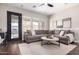 Relaxing living room with large sectional sofa, lots of windows, and modern decor at 20366 E Via De Colina --, Queen Creek, AZ 85142