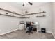 Home office featuring a desk, floating shelves, neutral walls, and a carpeted floor at 20366 E Via De Colina --, Queen Creek, AZ 85142