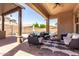 Inviting outdoor living area with covered patio, comfortable seating, and view of the refreshing pool at 20366 E Via De Colina --, Queen Creek, AZ 85142