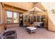 Charming patio with comfortable seating, stylish rug, umbrella, and brick flooring at 20366 E Via De Colina --, Queen Creek, AZ 85142