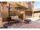 Inviting outdoor patio with comfortable seating and shade umbrella, perfect for relaxing and entertaining at 20366 E Via De Colina --, Queen Creek, AZ 85142