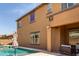 This backyard features a swimming pool with a tanning ledge, outdoor seating and desert landscaping at 20366 E Via De Colina --, Queen Creek, AZ 85142