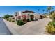 Charming stucco home with lush landscaping, red tile roof, and inviting curb appeal at 2132 E Northview Ave, Phoenix, AZ 85020