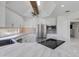 Well-equipped kitchen featuring white cabinets, marble countertops, and stainless steel appliances at 2132 E Northview Ave, Phoenix, AZ 85020