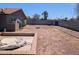 Large, sunny backyard with mature trees, block fence and lots of potential at 2179 E Palmcroft Dr, Tempe, AZ 85282