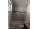 Bathroom features a bathtub with tiled shower and dark tile border accent at 2179 E Palmcroft Dr, Tempe, AZ 85282