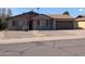 Charming single-story home with gravel landscaping and a two-car garage at 2179 E Palmcroft Dr, Tempe, AZ 85282