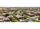 Expansive aerial view of a neighborhood with lush green landscaping at 2507 E Eleana Ln, Gilbert, AZ 85298