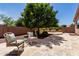 Comfortable backyard patio with cozy seating and landscaping, perfect for outdoor entertaining at 2507 E Eleana Ln, Gilbert, AZ 85298