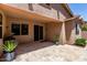 Covered patio with tile flooring, barbecue, and desert landscaping at 2507 E Eleana Ln, Gilbert, AZ 85298