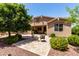 Backyard with paver patio, seating, and lush landscaping at 2507 E Eleana Ln, Gilbert, AZ 85298