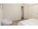 This bedroom features a fuzzy chair, a sliding closet and a bed with soft patterned linen at 300 N Gila Springs Blvd # 181, Chandler, AZ 85226