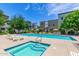 Community pool and spa with sun loungers at 300 N Gila Springs Blvd # 181, Chandler, AZ 85226