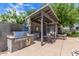 Community poolside BBQ area with stainless steel grill at 300 N Gila Springs Blvd # 181, Chandler, AZ 85226