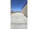 Exterior view of metal building and concrete expanse on the side at 30940 N Varnum Rd, San Tan Valley, AZ 85143