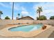 A sparkling pool surrounded by a deck, perfect for enjoying sunny days in your backyard oasis at 3138 W Danbury Dr, Phoenix, AZ 85053
