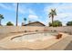 A refreshing pool surrounded by mature palm trees, ready for warm weather enjoyment at 3138 W Danbury Dr, Phoenix, AZ 85053