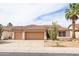 Charming single-story home boasts a well-maintained landscape, tile roof, and a spacious three-car garage at 4020 W Menadota Dr, Glendale, AZ 85308