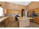 Bright kitchen features stainless steel appliances, tile floors, and access to the dining and living areas at 4020 W Menadota Dr, Glendale, AZ 85308
