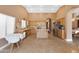 Bright kitchen featuring light-colored cabinets, stainless steel appliances, and a tiled floor, blending style and functionality at 4020 W Menadota Dr, Glendale, AZ 85308