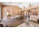 Open-concept floor plan integrates the living, dining, and kitchen areas for seamless entertaining at 4020 W Menadota Dr, Glendale, AZ 85308