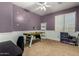 Spacious secondary bedroom with ample natural light, an air hockey table, and room for hobbies at 4123 S Wayne Pl, Chandler, AZ 85249