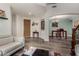 Inviting living room with wood floors, neutral color palette, and easy access to dining room at 4123 S Wayne Pl, Chandler, AZ 85249