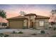 Charming single-story home featuring a two-car garage and beautiful desert landscaping at 42900 W Palo Amarillo Rd, Maricopa, AZ 85138