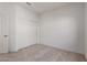 Bedroom featuring a closet and neutral carpet at 42930 W Palo Amarillo Rd, Maricopa, AZ 85138