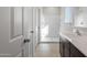Bathroom featuring a vanity with a sink and a shower-tub combination at 42945 W Palo Amarillo Rd, Maricopa, AZ 85138