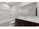 Bathroom featuring a vanity with a sink and a shower-tub combination at 42945 W Palo Amarillo Rd, Maricopa, AZ 85138