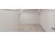 A walk-in closet with carpet and hanging racks is perfect for organizing clothes at 42955 W Palo Amarillo Rd, Maricopa, AZ 85138