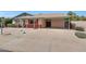 Charming front of home with covered parking, attractive landscaping, and a welcoming entrance at 4418 W Palo Verde Ave, Glendale, AZ 85302