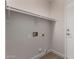 Closet with built-in shelving and laminate flooring, maximizing storage space and organization at 4526 E Bannock St, Phoenix, AZ 85044