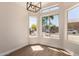 Bright dining area featuring multiple windows and modern lighting at 4526 E Bannock St, Phoenix, AZ 85044