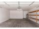 Spacious garage with concrete floors, utility connections, and storage options at 4526 E Bannock St, Phoenix, AZ 85044