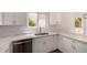 Bright modern kitchen features stainless steel appliances and white cabinetry at 4526 E Bannock St, Phoenix, AZ 85044