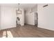 Spacious living room featuring hard surface flooring and modern lighting at 4526 E Bannock St, Phoenix, AZ 85044
