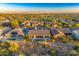 Aerial view of houses with pools in a desert community surrounded by natural desert landscaping at 5626 E Sleepy Ranch Rd, Cave Creek, AZ 85331