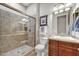 Well-designed bathroom with glass enclosed shower and vanity with sink at 5626 E Sleepy Ranch Rd, Cave Creek, AZ 85331