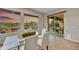 Bright dining room with backyard views provides a serene setting for meals and gatherings at 5626 E Sleepy Ranch Rd, Cave Creek, AZ 85331