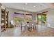 Stylish dining area with tile floors offers picturesque backyard views and easy access to an outdoor patio at 5626 E Sleepy Ranch Rd, Cave Creek, AZ 85331
