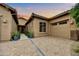 Charming single-story home with a three-car garage and desert landscaping at 5626 E Sleepy Ranch Rd, Cave Creek, AZ 85331