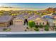 Inviting single-Gathering home with manicured landscaping, a brick driveway, and a two-car garage at 5626 E Sleepy Ranch Rd, Cave Creek, AZ 85331