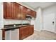 Modern kitchen with sleek cabinetry, stainless steel appliances, and granite countertop at 5626 E Sleepy Ranch Rd, Cave Creek, AZ 85331