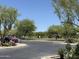 Community park featuring mature trees, flowering shrubs, and walking path at 5626 E Sleepy Ranch Rd, Cave Creek, AZ 85331